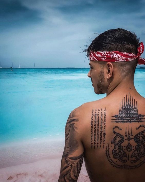 Hình xăm tattoo chữ Thái ở sau lưng mang nhiều ý nghĩa khác nhau Hình xăm tattoo chữ Thái đẹp và ý nghĩa nhất - Số 1