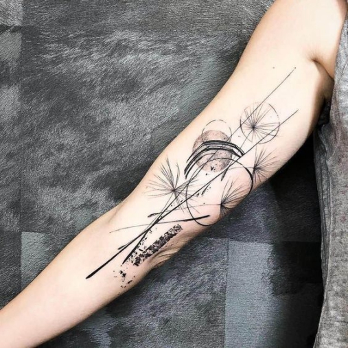 Hình xăm hoa văn bồ công anh ở vị trí bắp tay trong Hình tattoo xăm hoa văn bồ công anh mực đen kiểu dáng đơn giản dành cho bạn