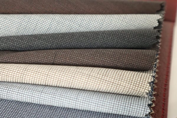 + 7 Chất Liệu Vải May Vest Công Sở Tốt Nhất Hiện Nay - May Đồng Phục Trimble - Công Ty May Đồng Phục TPHCM